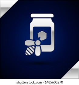 Silver Jar of honey with bee icon isolated on dark blue background. Sweet natural food in bank. Honeybee or apis with wings symbol. Flying insect.  Vector Illustration