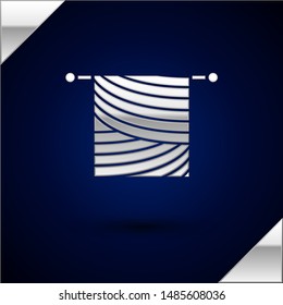 Silver Knitting icon isolated on dark blue background. Wool emblem with knitted fabric and needle. Label for hand made, knitting or tailor shop.  Vector Illustration