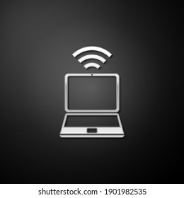 Silver Laptop and free wi-fi wireless connection icon isolated on black background. Wireless technology, wi-fi connection, wireless network. Long shadow style. Vector.