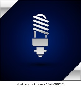Silver LED light bulb icon isolated on dark blue background. Economical LED illuminated lightbulb. Save energy lamp.  Vector Illustration