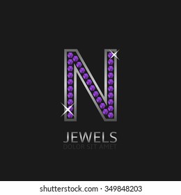 Silver Letter N logo with violet precious stones. Luxury, royal concept. Vector illustration