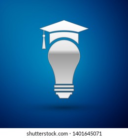 Silver Light bulb and graduation cap icon isolated on blue background. University Education concept. Vector Illustration