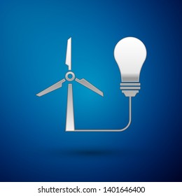 Silver Light bulb with wind turbine as idea of eco friendly source of energy icon isolated on blue background. Alternative energy concept. Vector Illustration