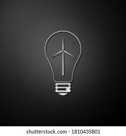 Silver Light bulb with wind turbine as idea of eco friendly source of energy icon isolated on black background. Alternative energy concept. Long shadow style. Vector.