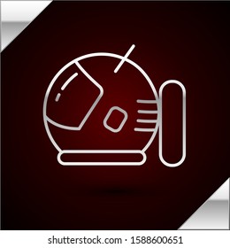 Silver line Astronaut helmet icon isolated on dark red background.  Vector Illustration