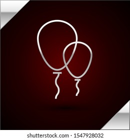 Silver line Balloons with ribbon icon isolated on dark red background.  Vector Illustration