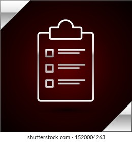 Silver line Clipboard with checklist icon isolated on dark red background. Control list symbol. Survey poll or questionnaire feedback form.  Vector Illustration