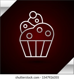 Silver line Cupcake icon isolated on dark red background.  Vector Illustration