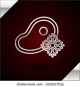 Silver line Fresh frozen steak meat icon isolated on dark red background.  Vector Illustration