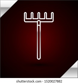 Silver line Garden rake icon isolated on dark red background. Tool for horticulture, agriculture, farming. Ground cultivator. Housekeeping equipment.  Vector Illustration
