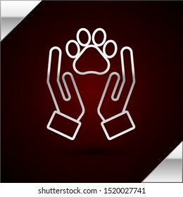 Silver line Hands with animals footprint icon isolated on dark red background. Pet paw in heart. Love to the animals.  Vector Illustration