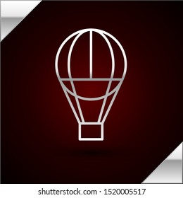 Silver line Hot air balloon icon isolated on dark red background. Air transport for travel.  Vector Illustration