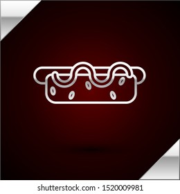 Silver line Hotdog sandwich with mustard icon isolated on dark red background. Sausage icon. Street fast food menu.  Vector Illustration