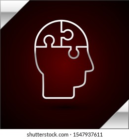 Silver line Human head puzzles strategy icon isolated on dark red background. Thinking brain sign. Symbol work of brain.  Vector Illustration