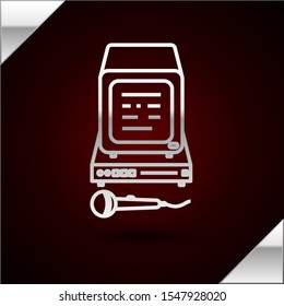 Silver line Karaoke icon isolated on dark red background. Microphone and monitor.  Vector Illustration