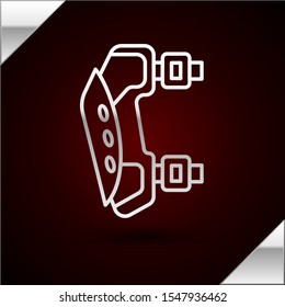 Silver line Knee pads icon isolated on dark red background. Extreme sport. Sport equipment. Skateboarding, bicycle, roller skating protective gear.  Vector Illustration