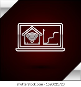 Silver line Laptop with smart home with wi-fi icon isolated on dark red background. Remote control.  Vector Illustration