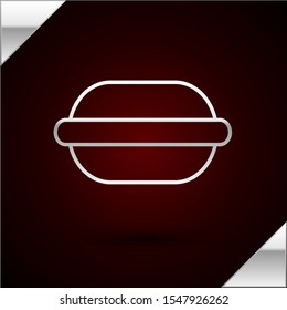Silver line Macaron cookie icon isolated on dark red background. Macaroon sweet bakery.  Vector Illustration