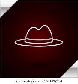 Silver line Man hat with ribbon icon isolated on dark red background.  Vector Illustration