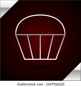 Silver line Muffin icon isolated on dark red background.  Vector Illustration