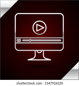 Silver line Online play video icon isolated on dark red background. Computer monitor and film strip with play sign.  Vector Illustration