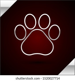 Silver line Paw print icon isolated on dark red background. Dog or cat paw print. Animal track.  Vector Illustration