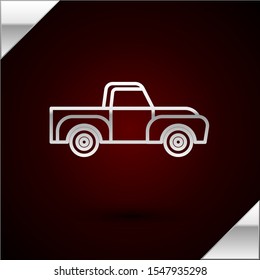 Silver line Pickup truck icon isolated on dark red background.  Vector Illustration