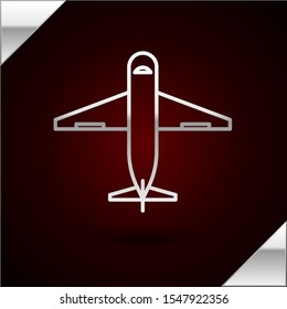 Silver line Plane icon isolated on dark red background. Delivery, transportation. Cargo delivery by air. Airplane with parcels, boxes.  Vector Illustration