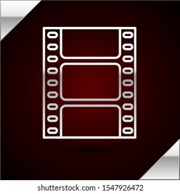 Silver line Play Video icon isolated on dark red background. Film strip sign.  Vector Illustration