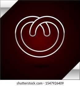 Silver line Pretzel icon isolated on dark red background. German comfort food pastry. Oktoberfest festival.  Vector Illustration