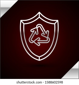 Silver line Recycle symbol inside shield icon isolated on dark red background. Eco protection sign.  Vector Illustration