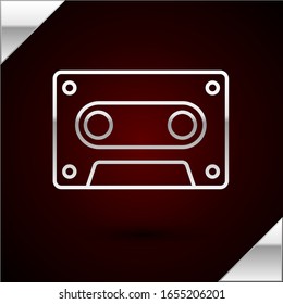 Silver line Retro audio cassette tape icon isolated on dark red background.  Vector Illustration