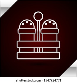 Silver line Salt and pepper icon isolated on dark red background. Cooking spices.  Vector Illustration