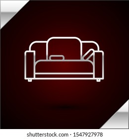 Silver line Sofa icon isolated on dark red background.  Vector Illustration