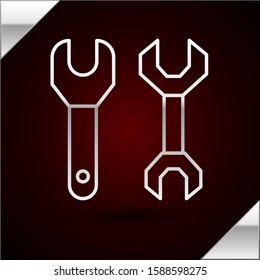 Silver line Spanner icon isolated on dark red background.  Vector Illustration