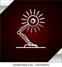 Silver line Table lamp icon isolated on dark red background. Table office lamp.  Vector Illustration