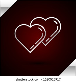 Silver line Two Linked Hearts icon isolated on dark red background. Romantic symbol linked, join, passion and wedding. Valentine day symbol.  Vector Illustration