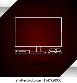 Silver line Video game console icon isolated on dark red background. Game console with joystick and lcd television.  Vector Illustration