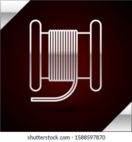 Silver line Wire electric cable on a reel or drum icon isolated on dark red background.  Vector Illustration