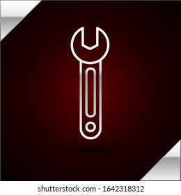 Silver line Wrench icon isolated on dark red background. Spanner icon.  Vector Illustration