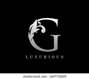 Silver Luxury Letter G . Graceful royal style. Calligraphic beautiful logo. Vintage drawn emblem for book design, weeding card, brand name, business card, Restaurant, Boutique, Hotel. 