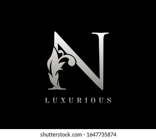 Silver Luxury Letter X . Graceful royal style. Calligraphic beautiful logo. Vintage drawn emblem for book design, weeding card, brand name, business card, Restaurant, Boutique, Hotel. 