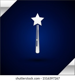 Silver Magic wand icon isolated on dark blue background. Star shape magic accessory. Magical power.  Vector Illustration