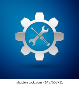 Silver Maintenance symbol - wrench and screwdriver in gear icon isolated on blue background. Service tool symbol.  Vector Illustration