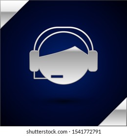Silver Man with a headset icon isolated on dark blue background. Support operator in touch. Concept for call center, client support service.  Vector Illustration