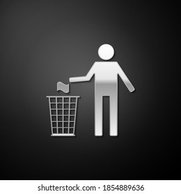 Silver Man throwing trash into dust bin icon isolated on black background. Recycle symbol. Long shadow style. Vector.