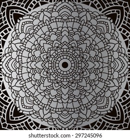 Silver mandala on black background. Indian pattern