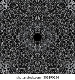 Silver mandala on black background. Ethnic vintage pattern.