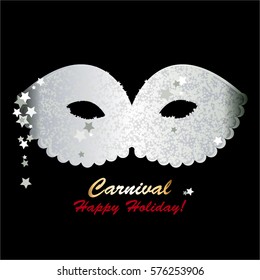 Silver mask on a black background. Carnival. Happy Holiday