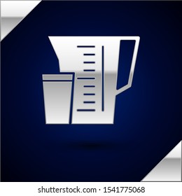 Silver Measuring cup to measure dry and liquid food icon isolated on dark blue background. Plastic graduated beaker with handle.  Vector Illustration